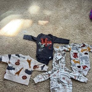 First picture is 0-3 months boy animal clothes! Second picture is newborn animal